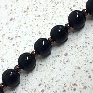 Бусины на нити 085 коричневые