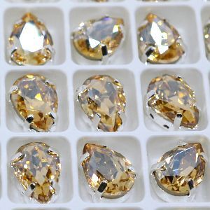 Страз в цапе капля 3003-140, 6х8 мм, 10х7 мм, 10х14 мм, цвет Crystal Golden Laght Страз в цапе капля 3003-140, 6х8 мм, 10х7 мм, 10х14 мм, цвет Crystal Golden Laght