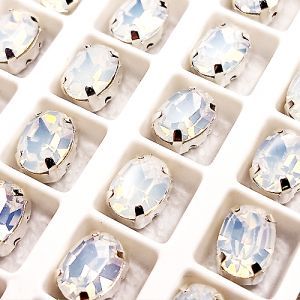 Страз в цапе 3022-124, овал, 6х8 мм, White Opal Страз в цапе 3022-124, овал, 6х8 мм, White Opal