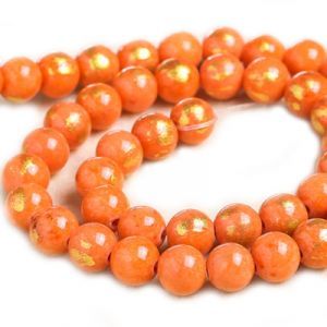 Бусины из камня на нити 8 мм, оранжевый с золотом Бусины из камня на нити 8 мм, оранжевый с золотом