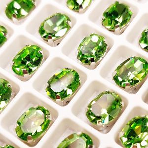 Страз в цапе 3022-107, овал 6х8 мм, Peridot, в серебряном цапе