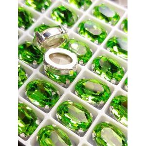 Стразы в серебряном цапе К9 овальные, цвет зелёный (Peridot)
