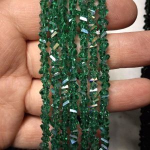 Бусины Трианглы (Triangle beads) на нити 020 AB, зелёный люстр